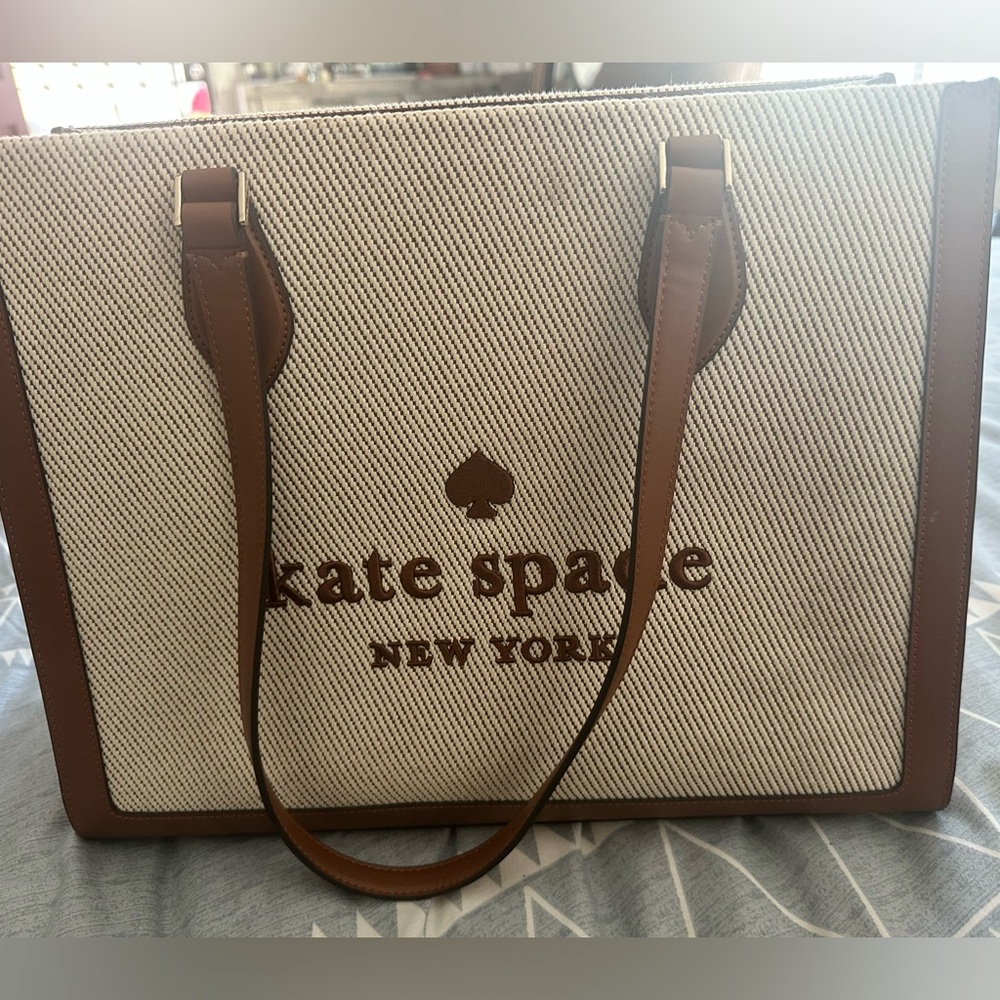 Kate spade Large tote in gingerbread 
Used twice still looks brand new.